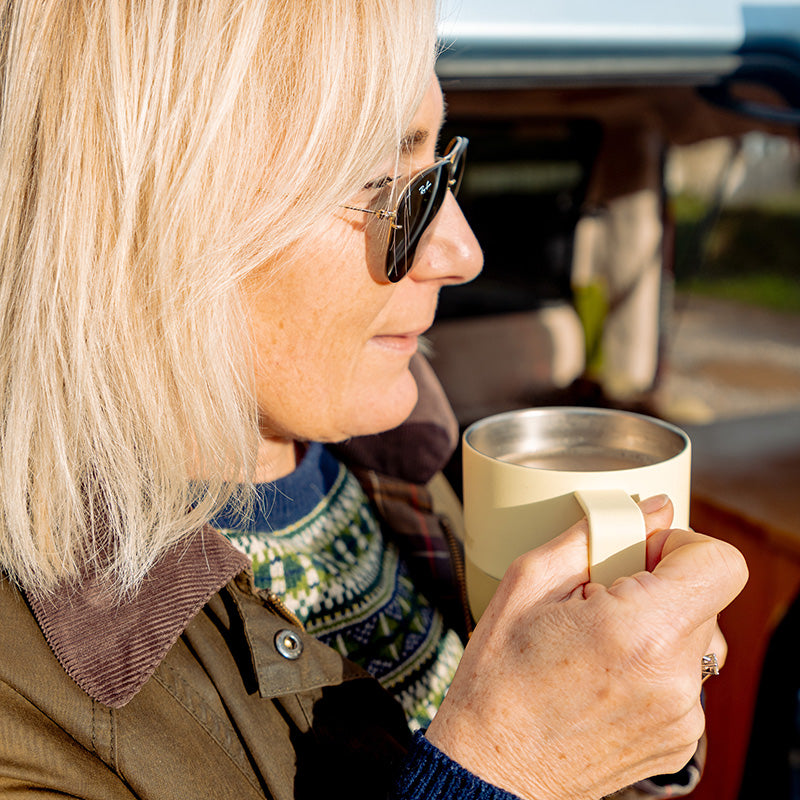 12oz-rise-mug-z9 12oz_rise_coffee_mug_wax_yellow_woman_drink_closeup_square.jpg