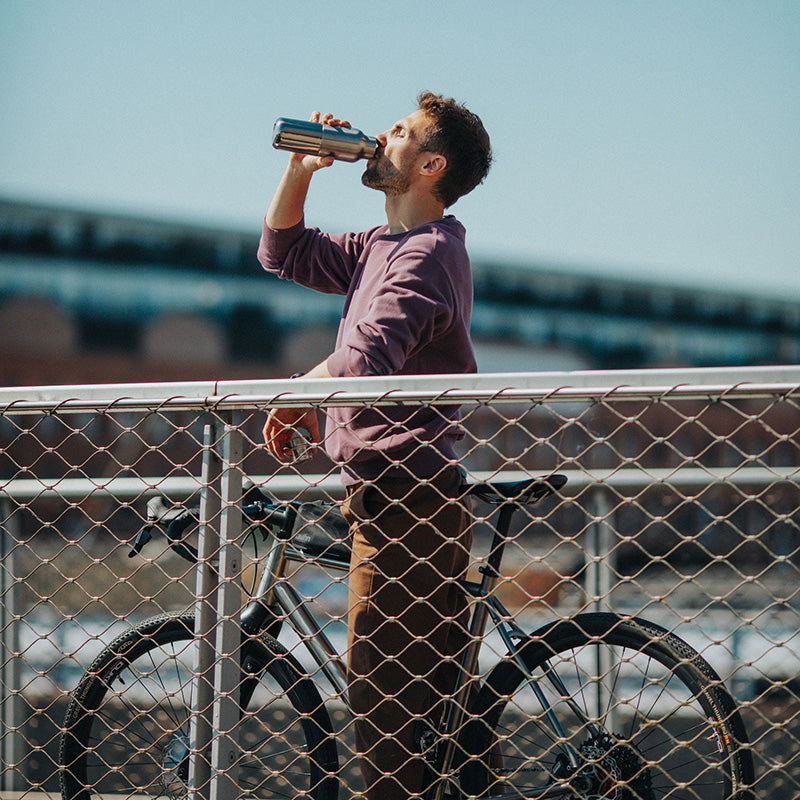12oz-rise-reflect-with-bamboo-cap-m8 16oz_rise_reflect_man_bike_square.jpg
