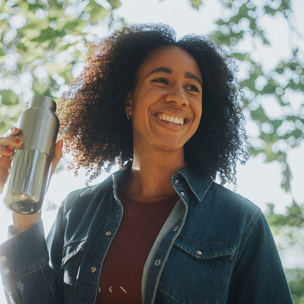 bring-your-own-party-kit-tumblers-and-cocktails-w5 16oz_rise_reflect_woman_smile_square.jpg