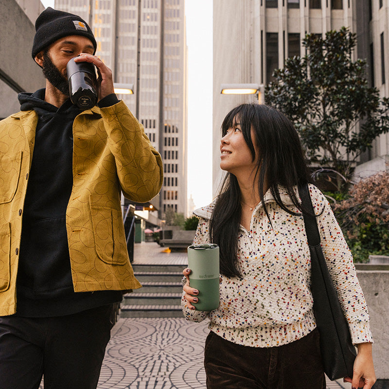 16oz-rise-tumbler-u2 16oz_rise_tumbler_black_iceberg_couple_drink_city_street_square.jpg