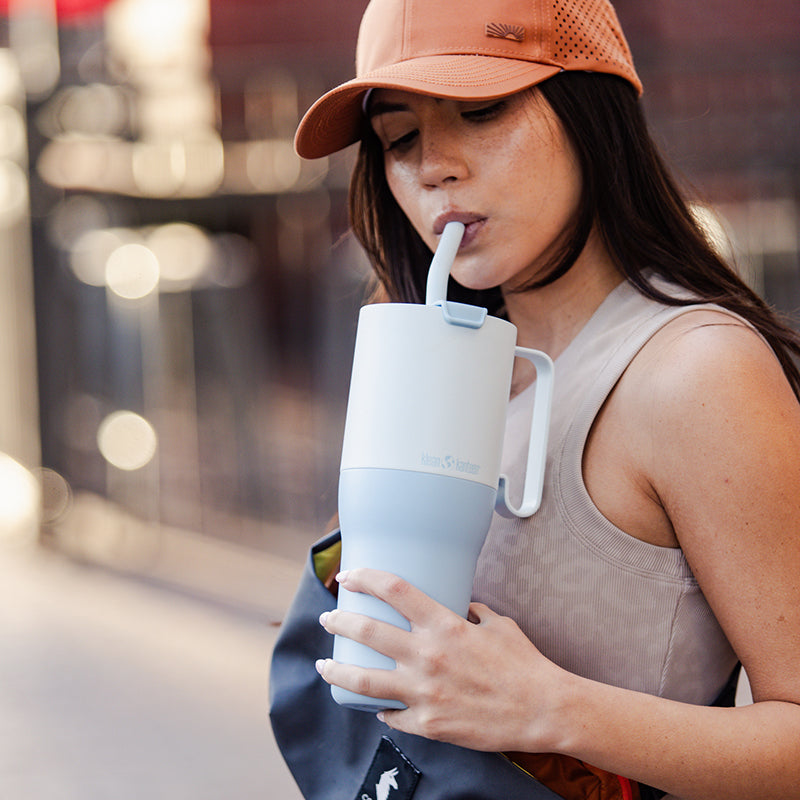 36oz-rise-tumbler-with-straw-lid-b5 36oz_rise_tumbler_straw_girl_sip_square.jpg