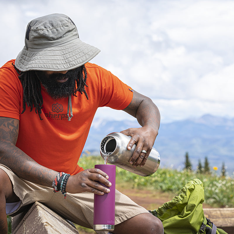 64oz-tkwide-with-loop-cap-j6 tkwide_64oz_bottle_backpacker_mountains_filling_square.jpg