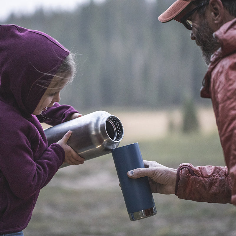 64oz-tkwide-with-loop-cap-j6 tkwide_64oz_bottle_girl_dad_filling_square.jpg